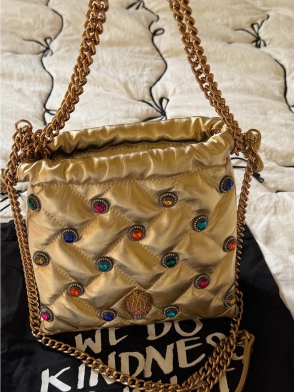 Gold Quilted Crossbody Bag with Multicolor Gem Accents. Not available anywhere.